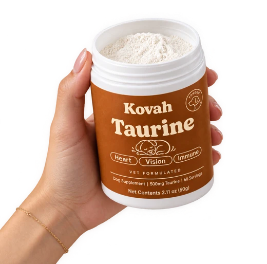 Hand holding an open tub of Kovah Taurine